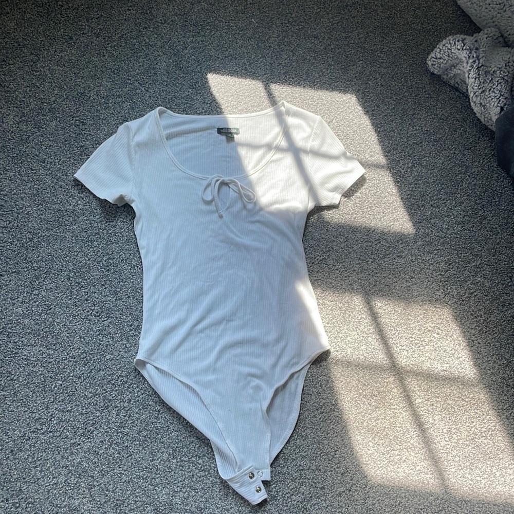 white tee bodysuit